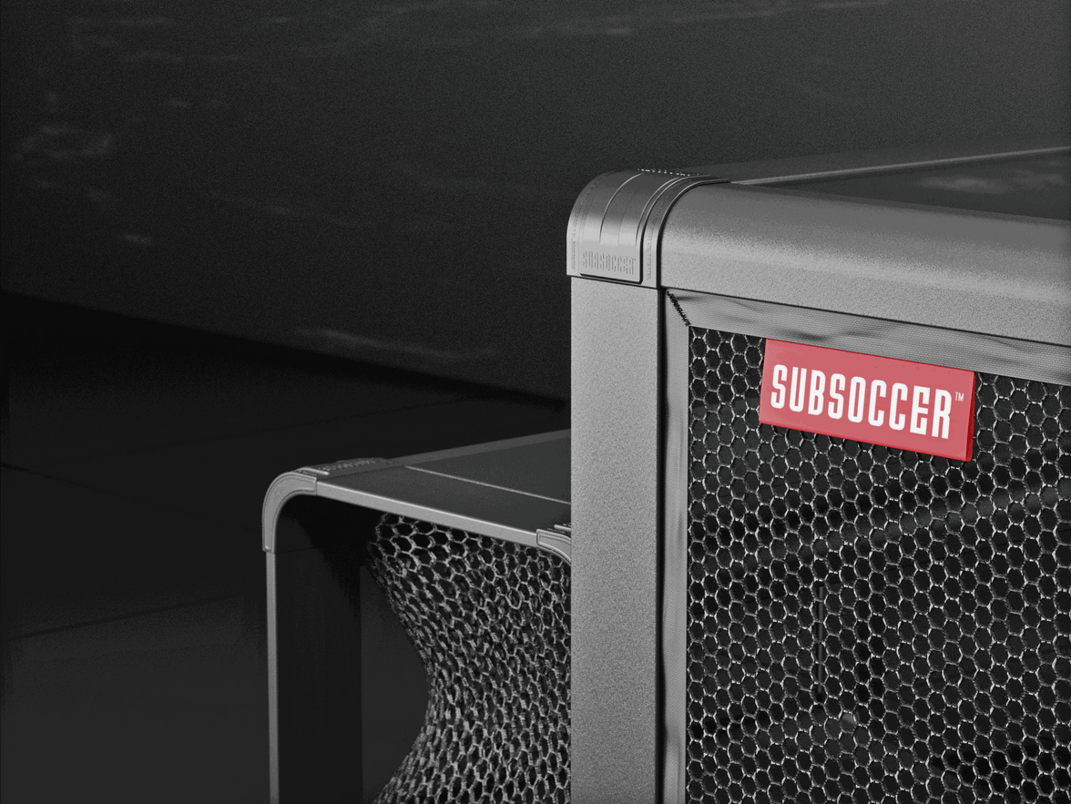 Close-up of Subsoccer S7 durable game bench with hexagonal netting and Subsoccer logo in modern design for indoor and outdoor use.